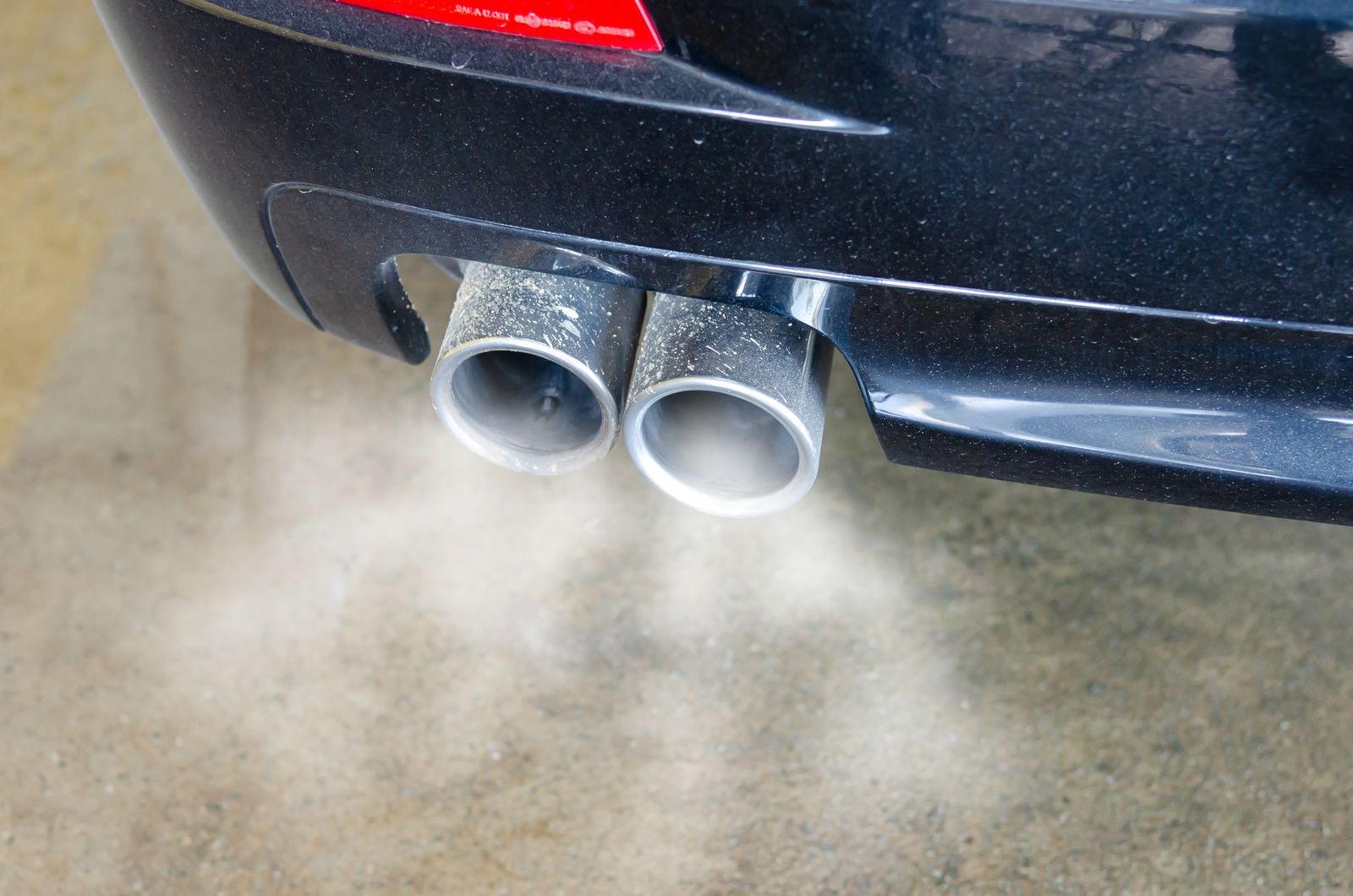 Exhaust tailpipes on the back of a car